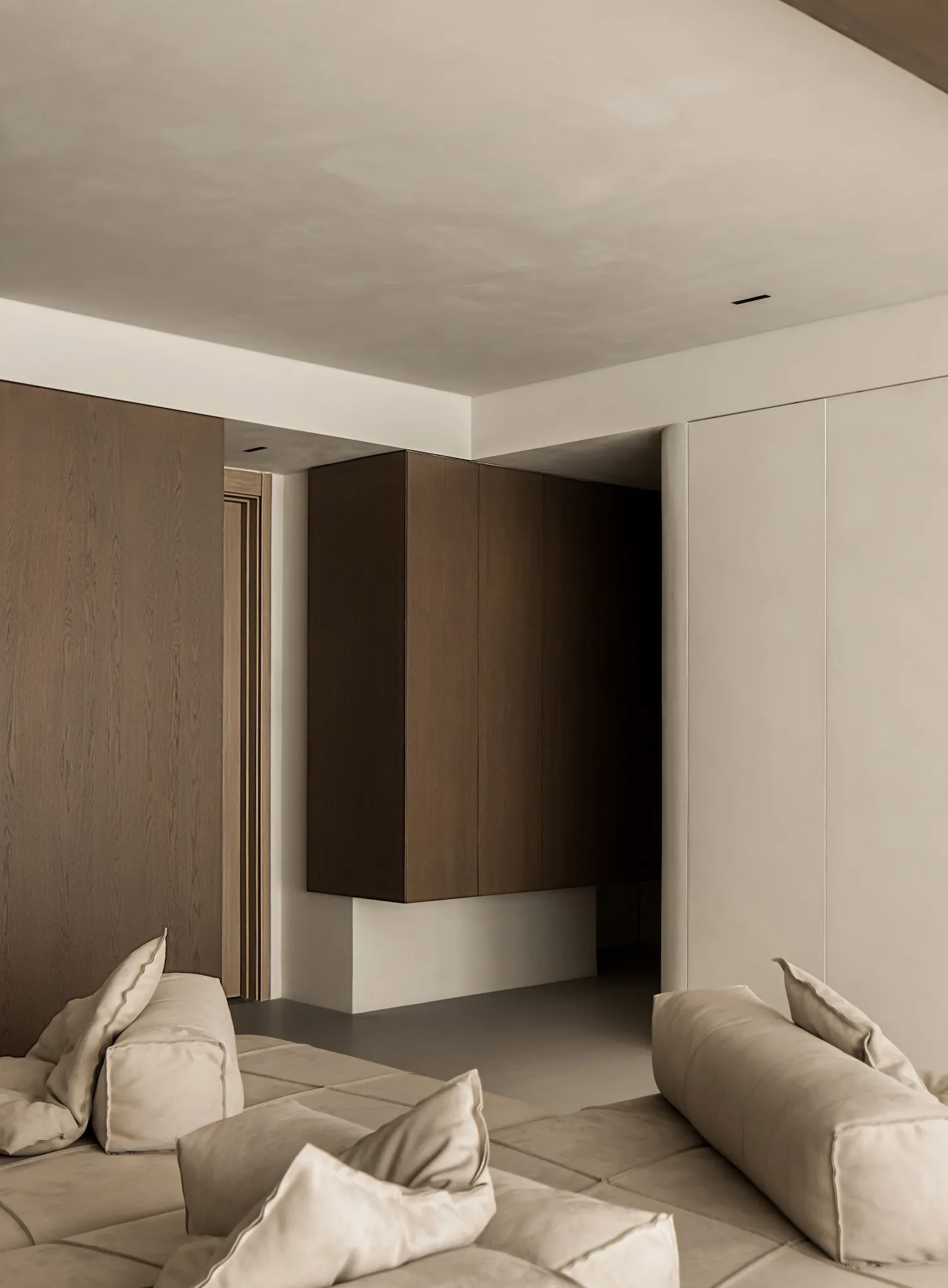 Modern minimalist room with wooden panels on the walls and ceiling, minimalistic furniture.