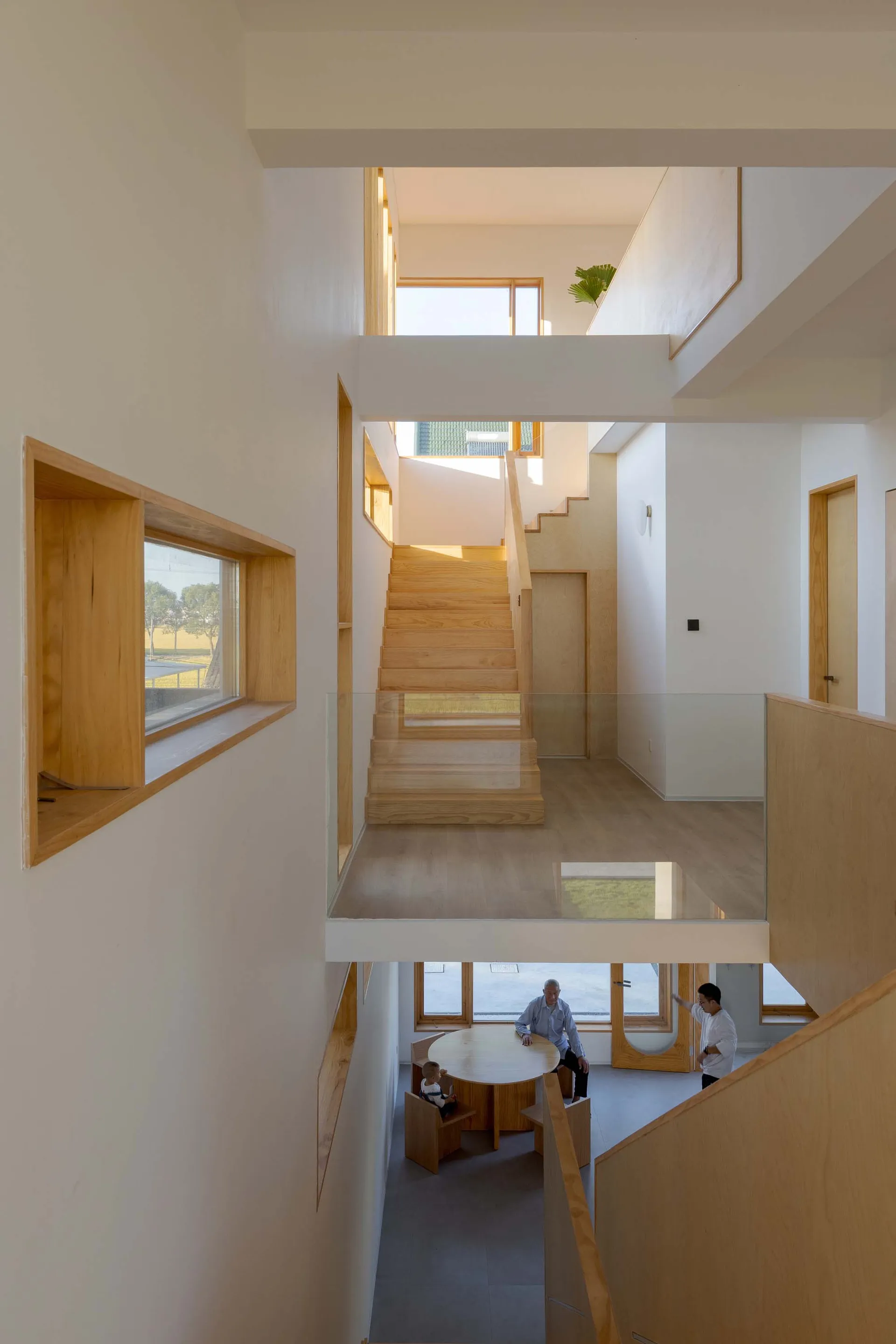 A modern residential interior with wooden architectural features.