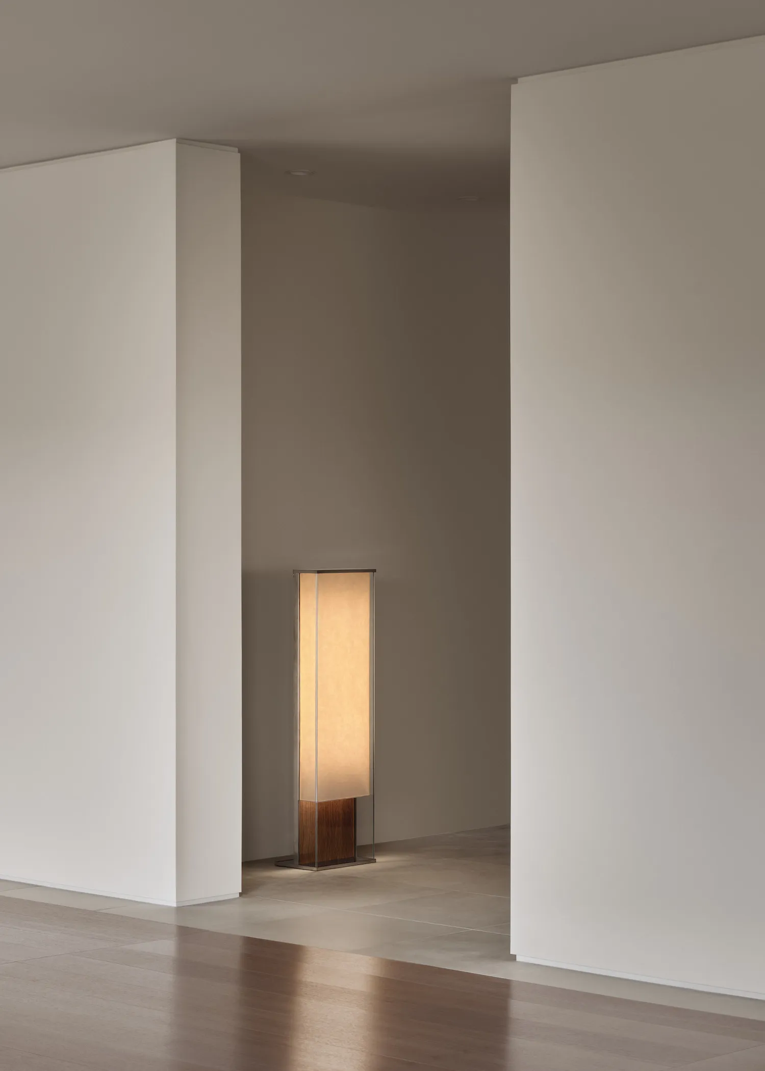 Minimalist floor lamp with wooden base and fabric shade