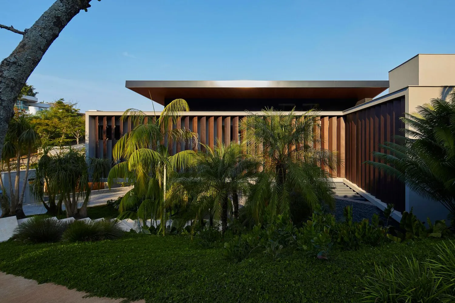 Modern house exterior with wooden and glass elements