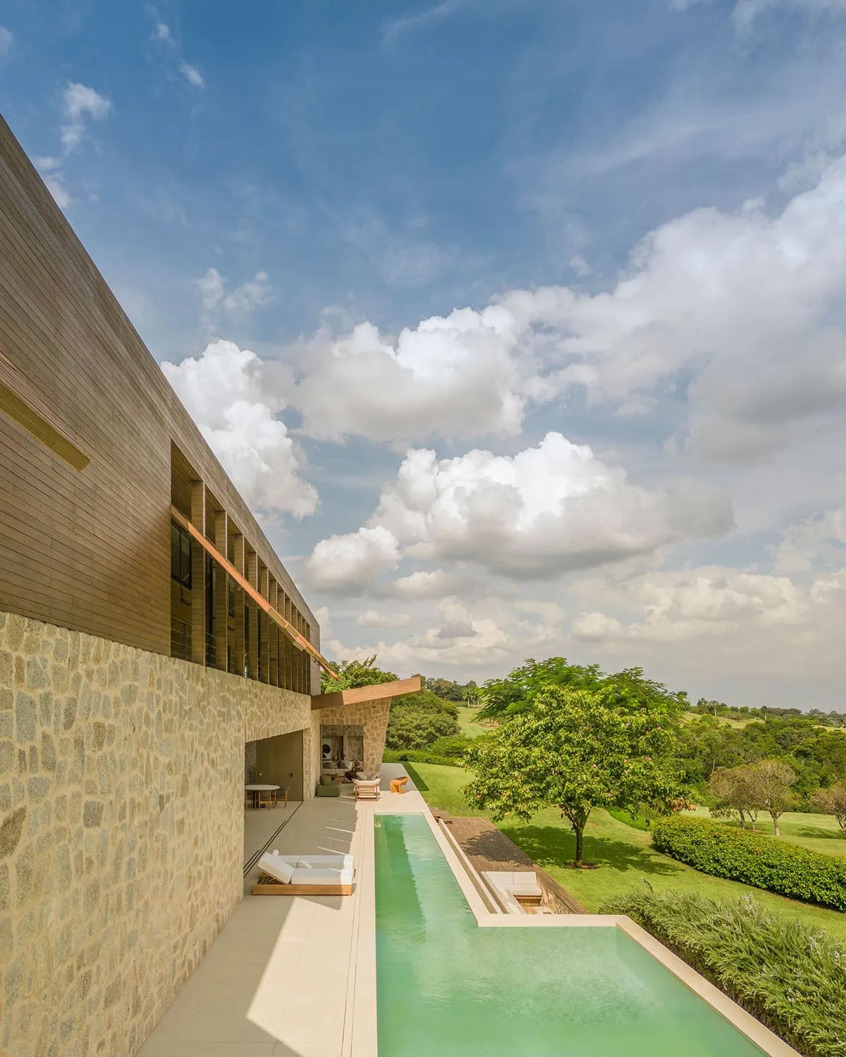 Modern house with a pool and stucco concrete exterior