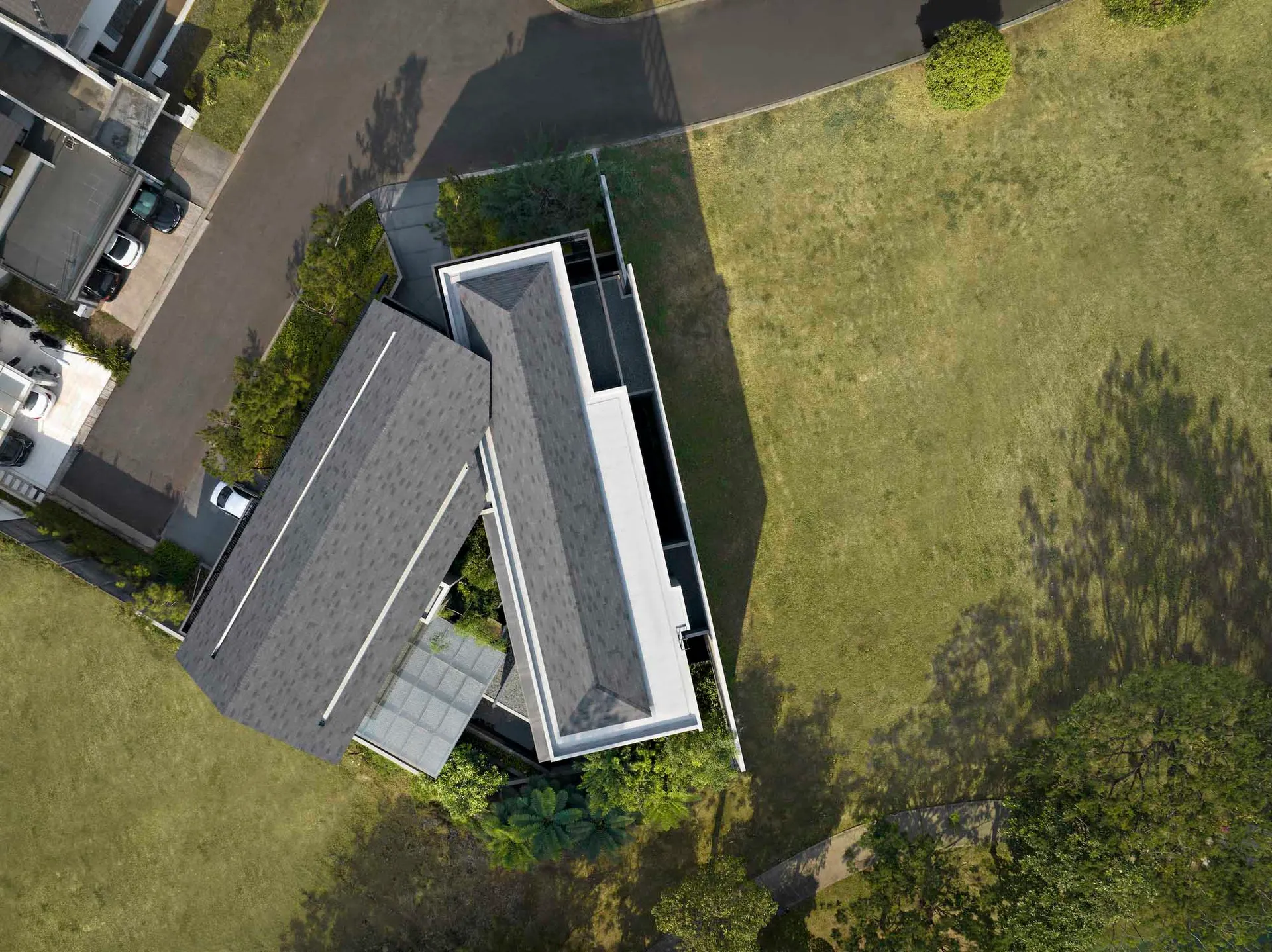 A modern house with a concrete and metal exterior.