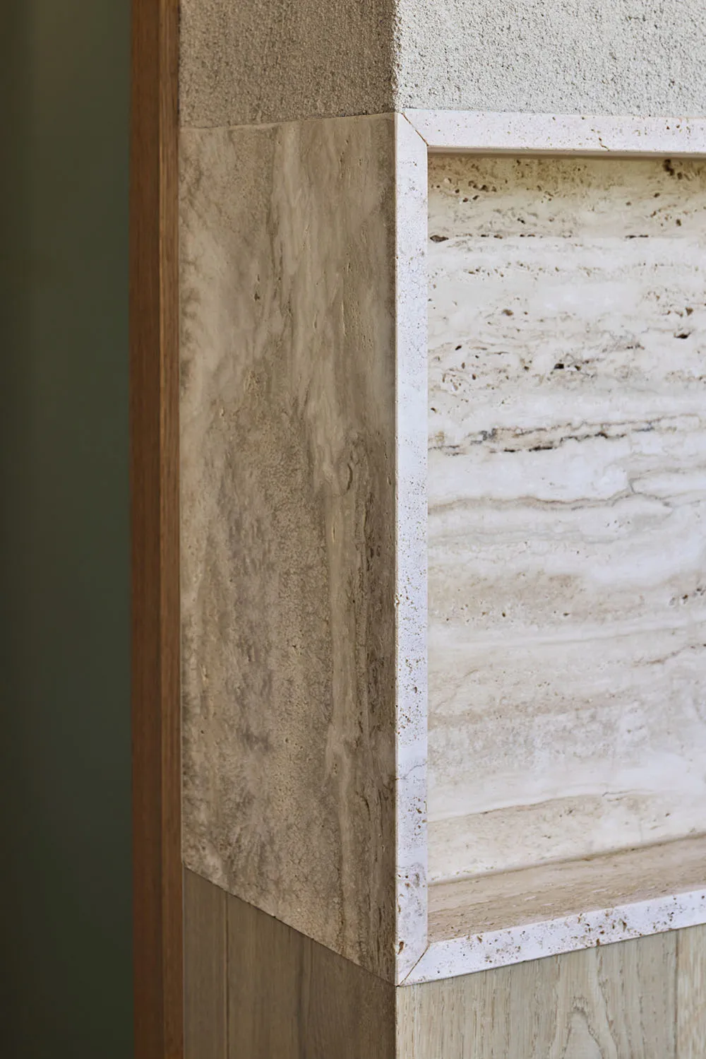 Modern bathroom featuring marble and concrete materials.
