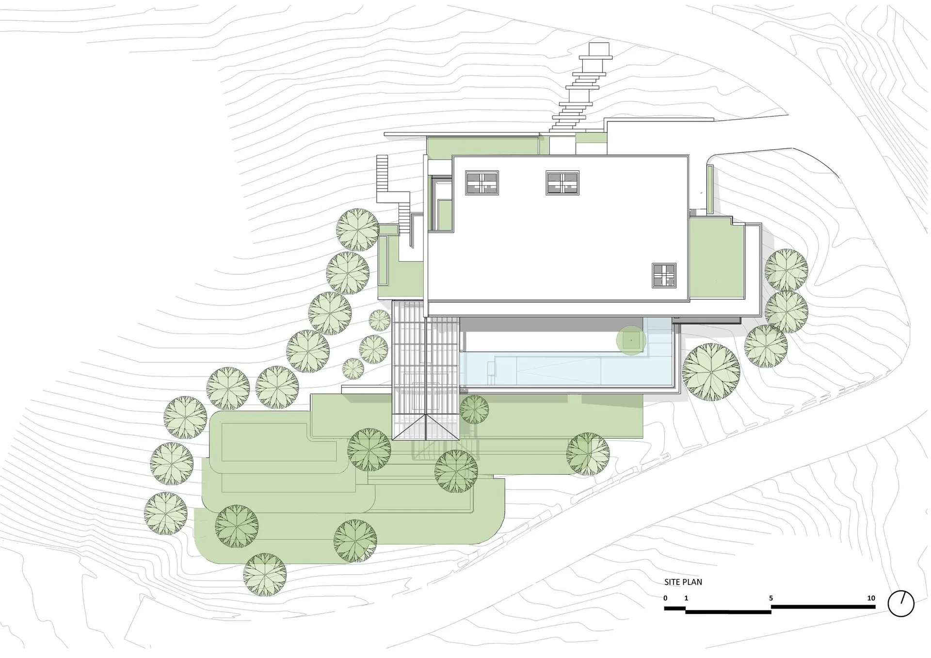 A modern house designed with glass, concrete, and metal materials