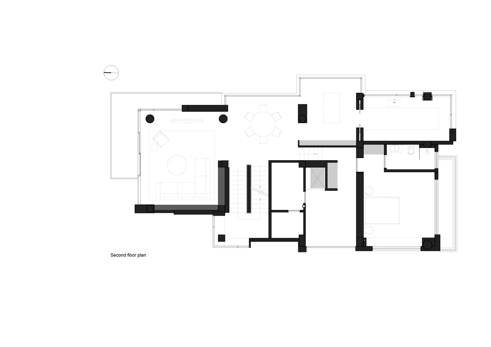 Second floor architectural plan of a modern minimalist house featuring open spaces and clean lines.