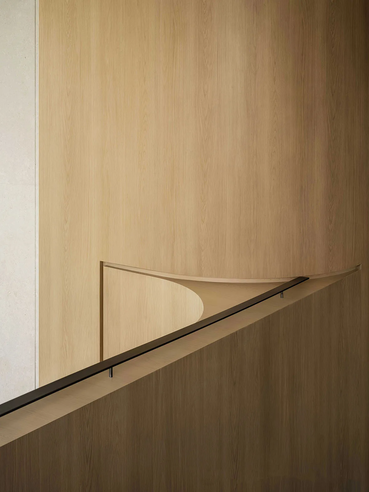 Modern interior design featuring wood-paneled walls and sleek, minimalist decor.