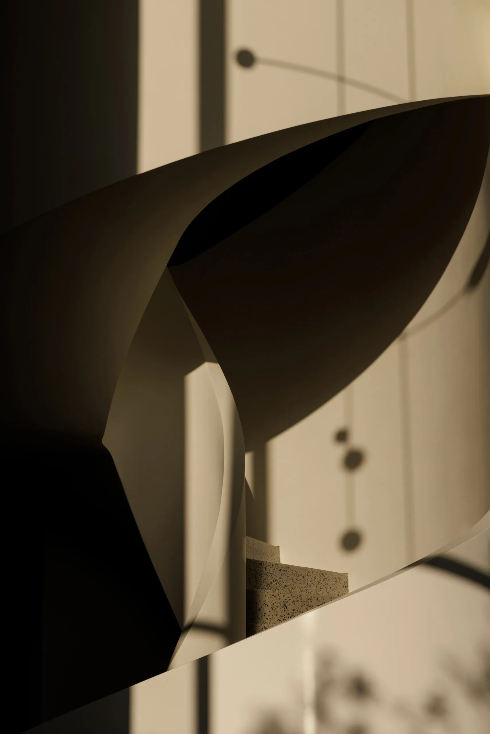 An abstract image showcasing a modern interior design featuring glass, concrete, and wooden textures.