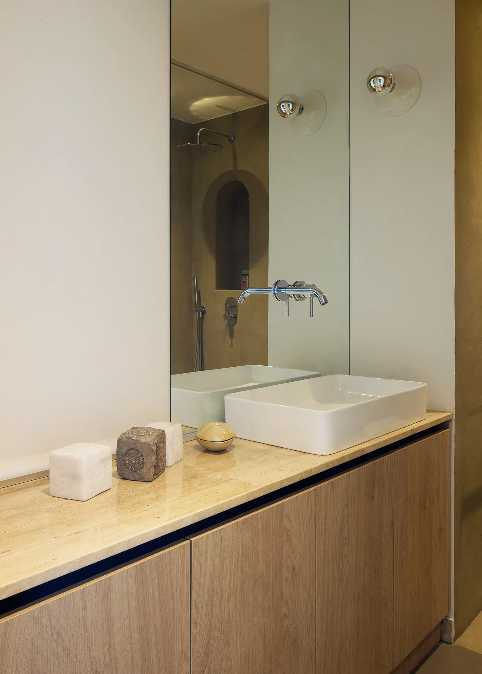 Modern bathroom with ceramic tile floor and walls.