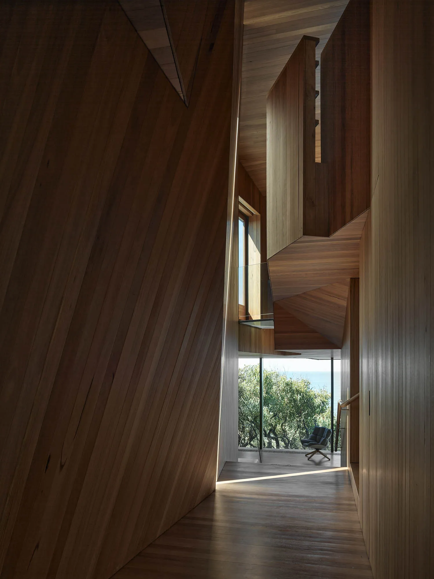Photograph of a modern architectural interior with wooden materials.