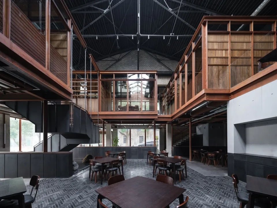 Modern cafe interior with concrete walls and industrial design