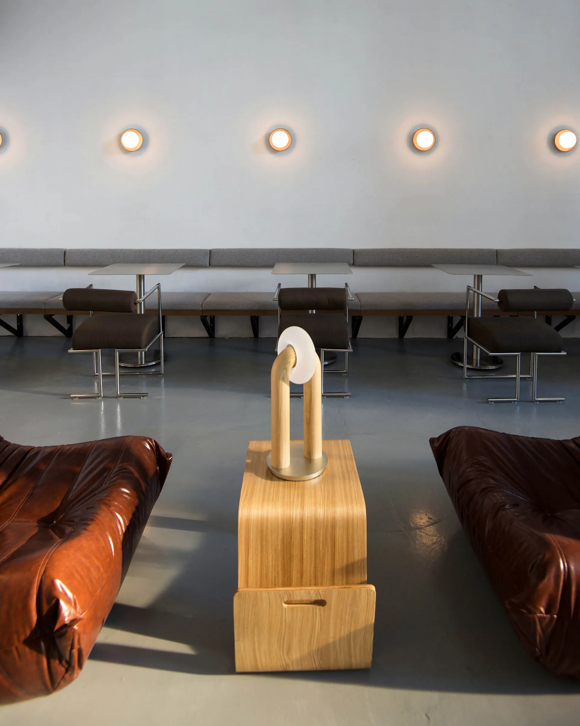 Modern minimalist interior design featuring contemporary materials and furniture.