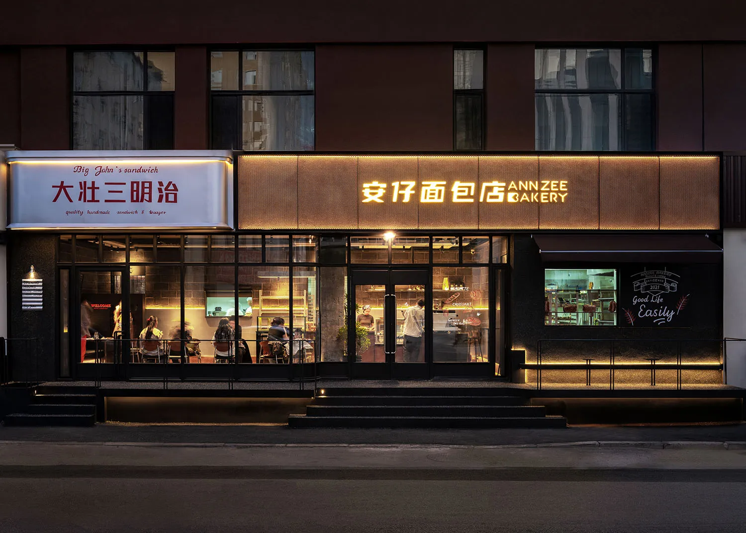 現代麵包店店面,搭配玻璃窗與發光招牌。