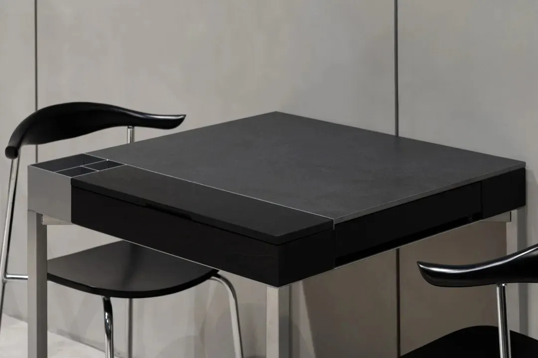 A sleek, modern metal desk in black.