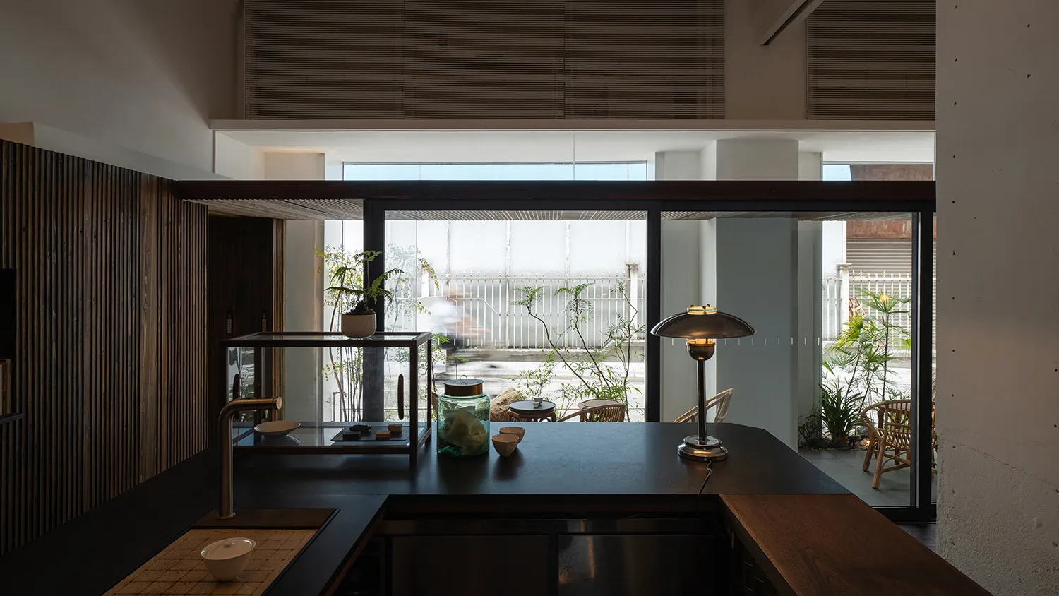 Modern home interior featuring a combination of glass, steel, and wood materials.