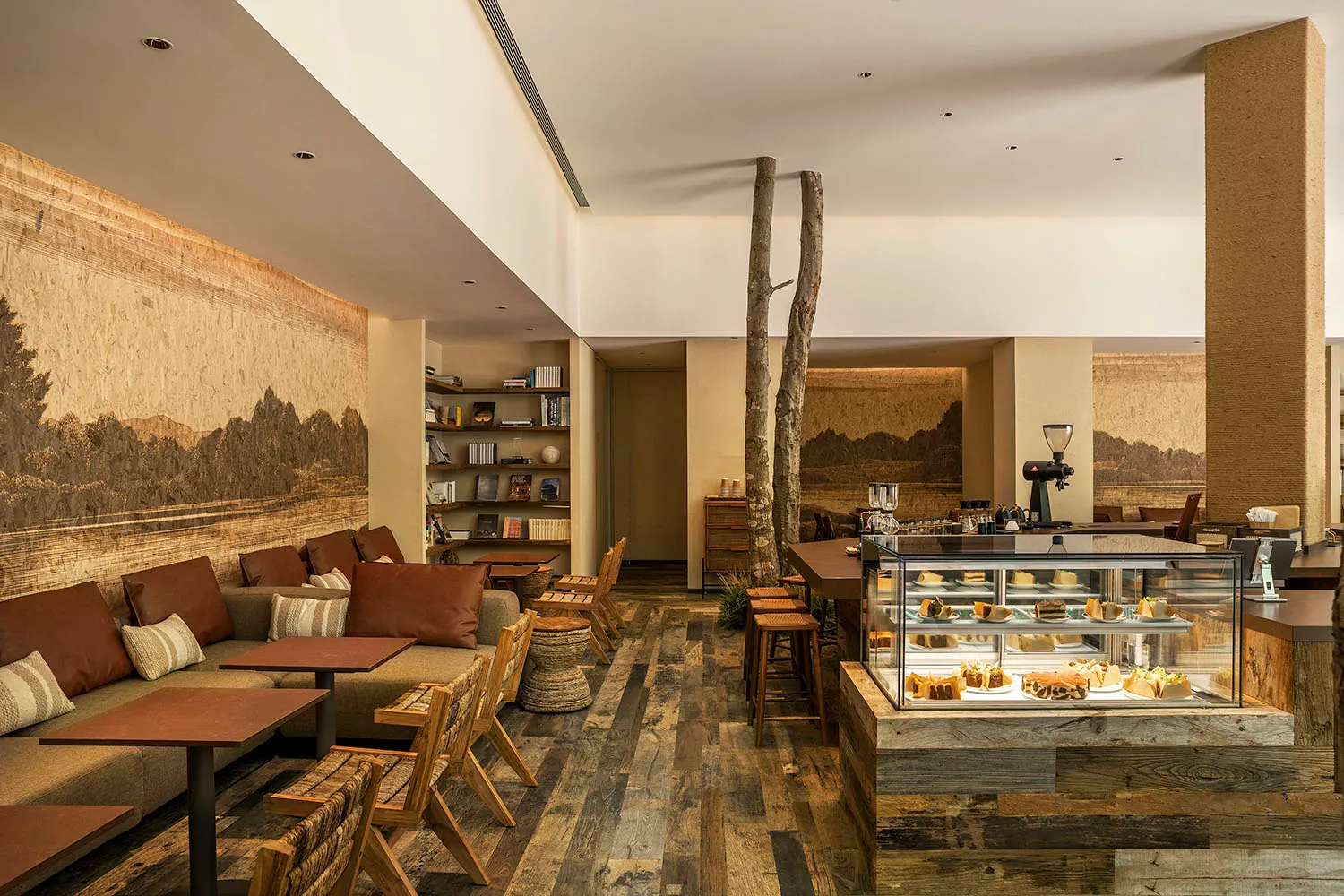 A cozy cafe interior with wooden elements and a rustic design.