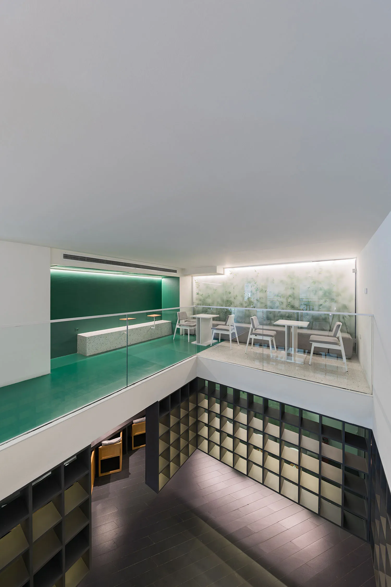 Modern cafe interior with concrete, glass, and metal materials