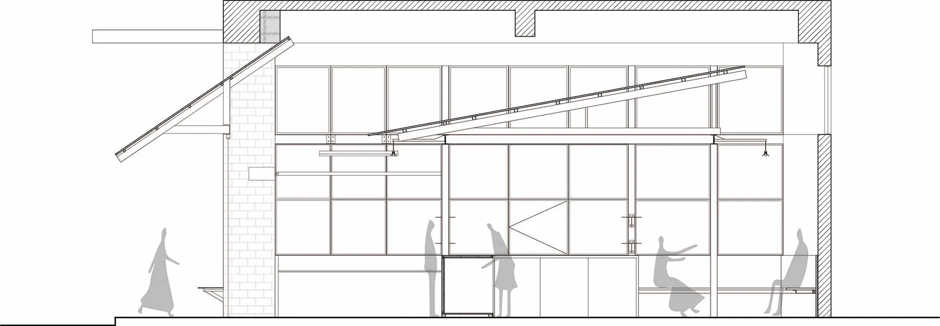 Modern interior design with glass walls, showing sleek architecture and open space.