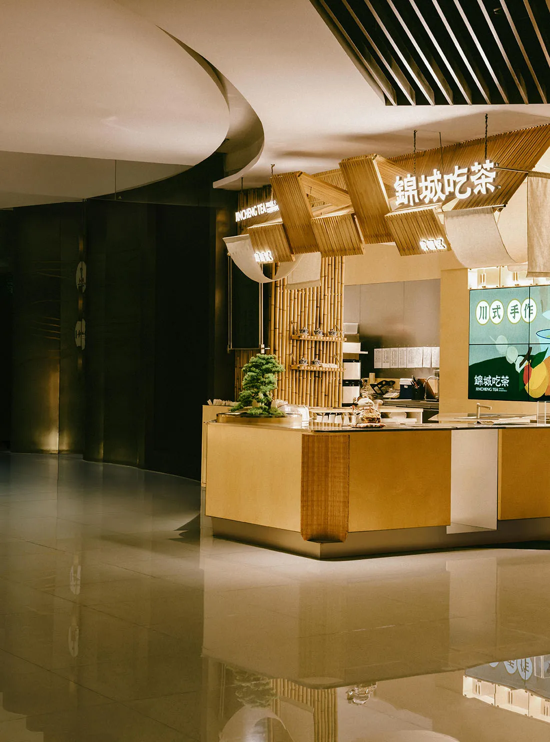 Modern restaurant interior designed with wooden elements and a minimalist aesthetic.