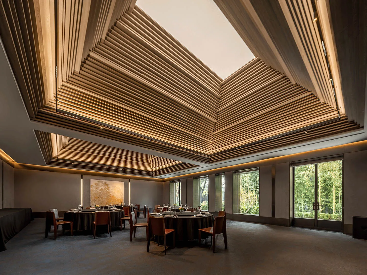 A modern restaurant interior with a wooden slat ceiling