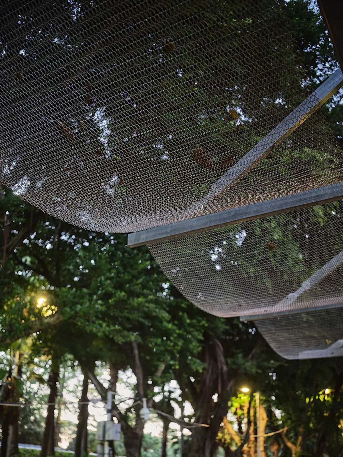 Metal wire mesh ceiling in an industrial retail space