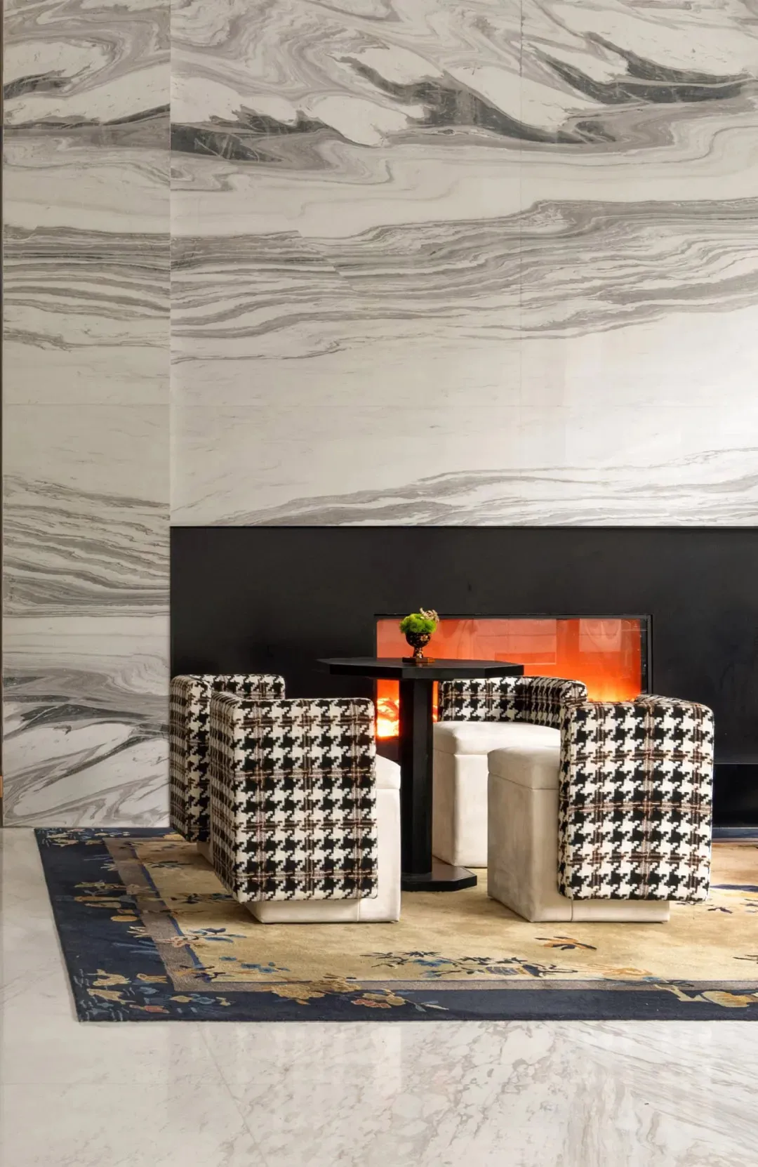 Modern retail storefront featuring a concrete and marble interior design.