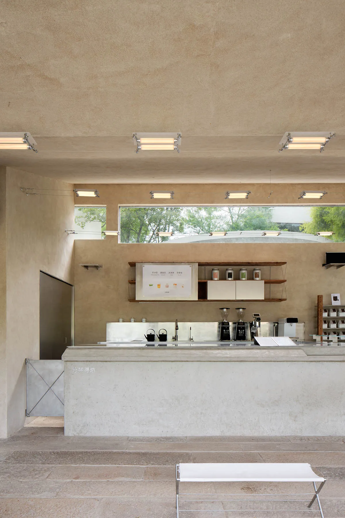 Concrete minimalist coffee shop counter with modern design