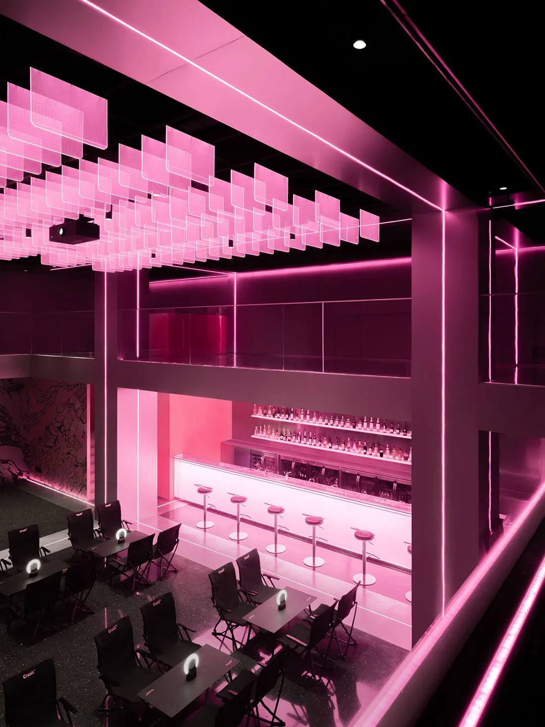 Modern industrial bar with transparent lighting panels and café interior design.