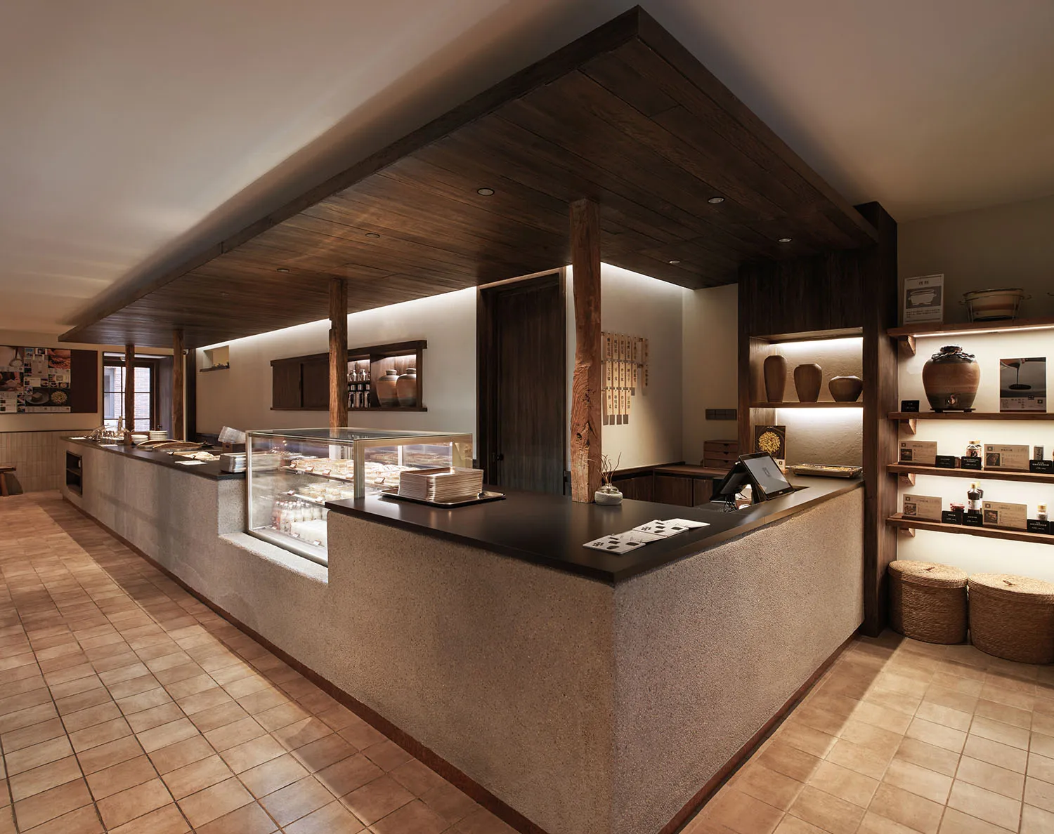 Modern coffee shop interior showcasing sleek, wood finishes