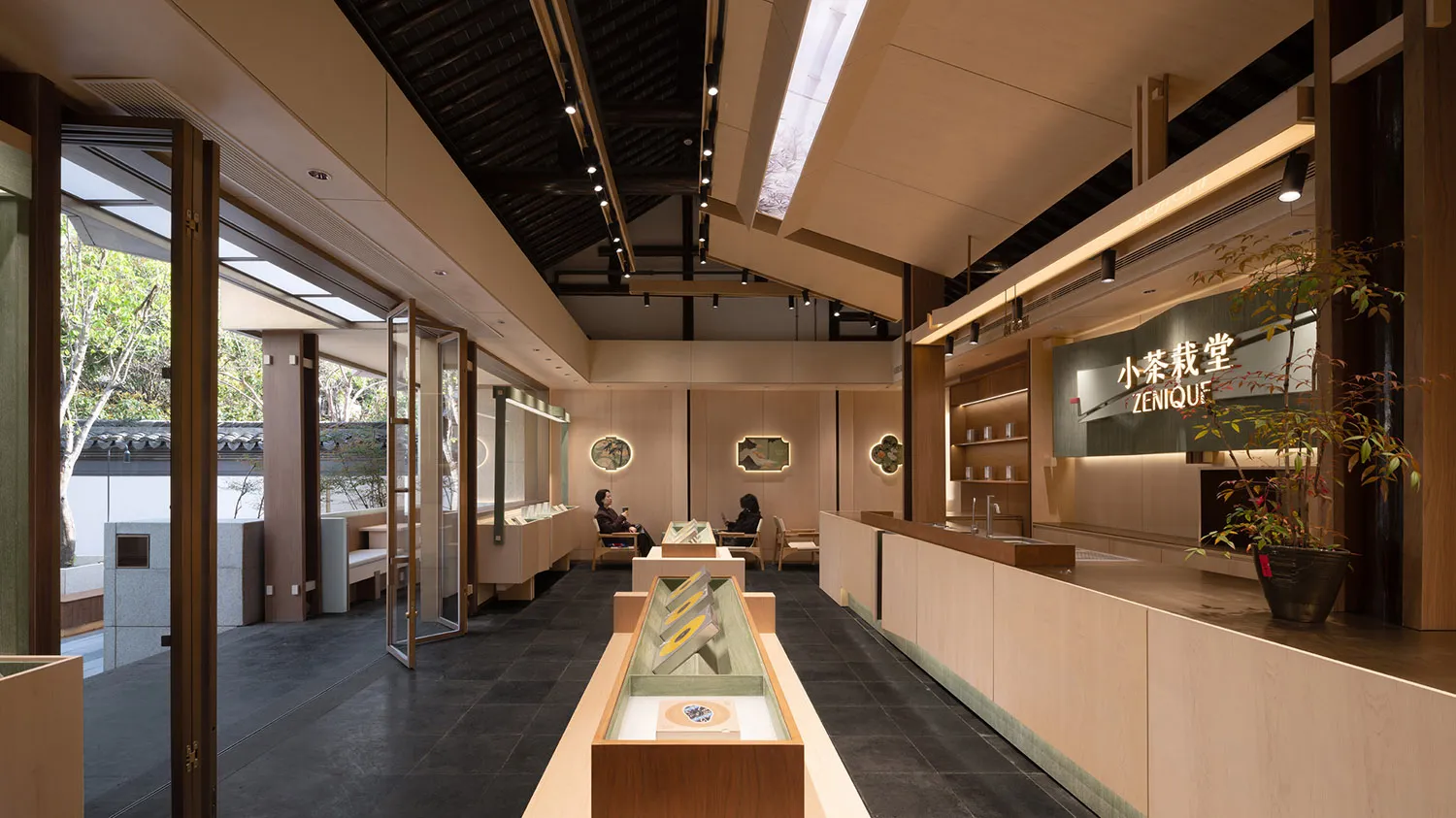 Modern coffee shop featuring wooden beams and seating areas
