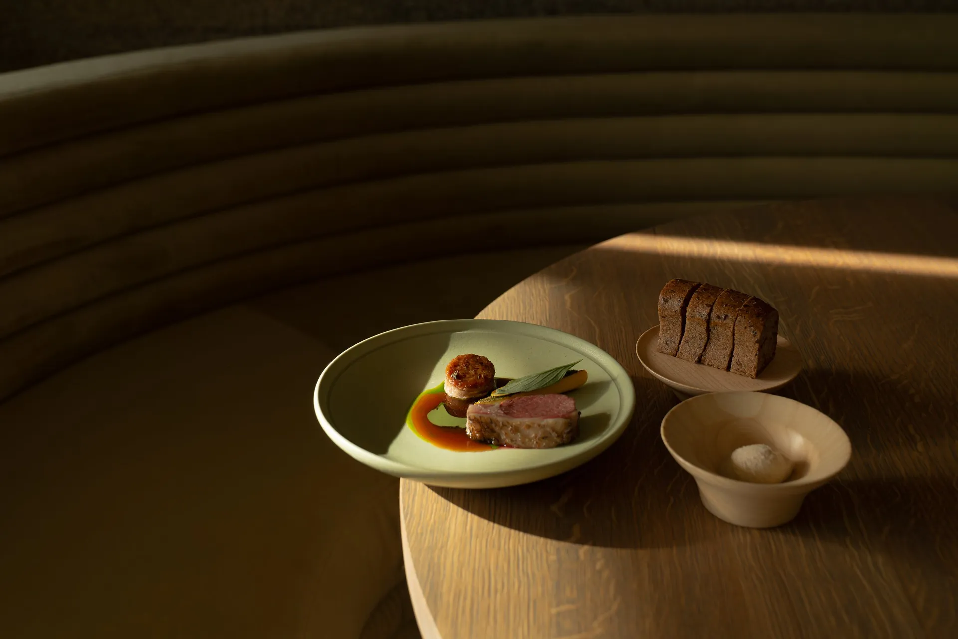 A modern food presentation featuring wood elements.