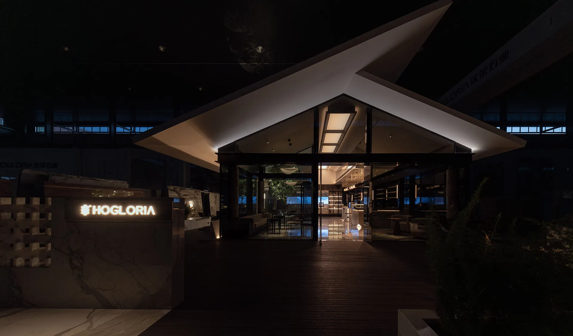 A modern retail storefront featuring glass materials and contemporary design elements.