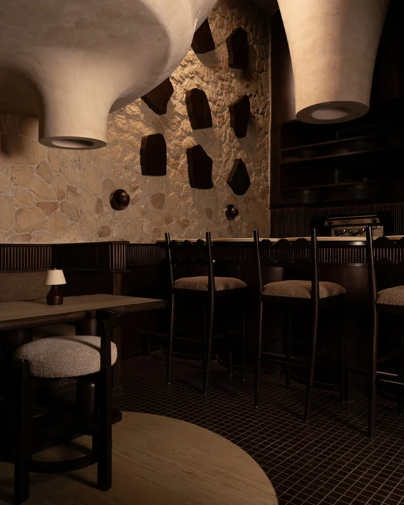 Modern restaurant bar interior with rustic wood elements