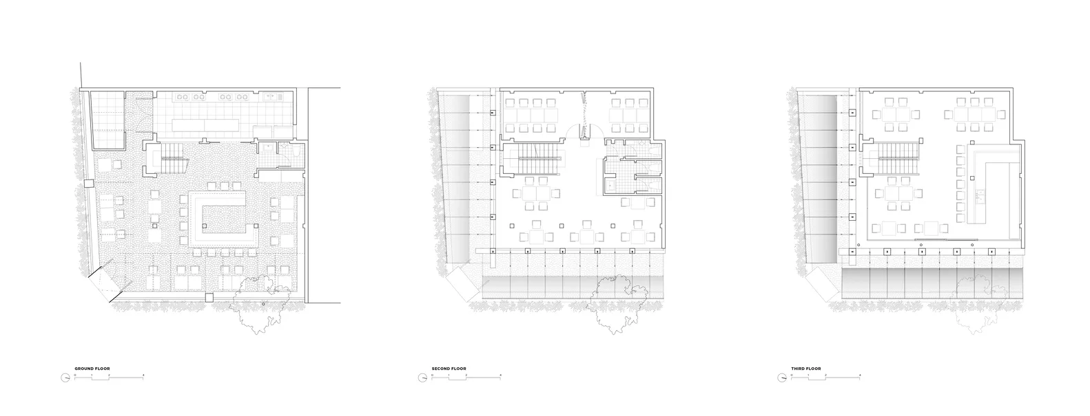Floor plans depicting the layout of an office on the ground, second, and third floors.