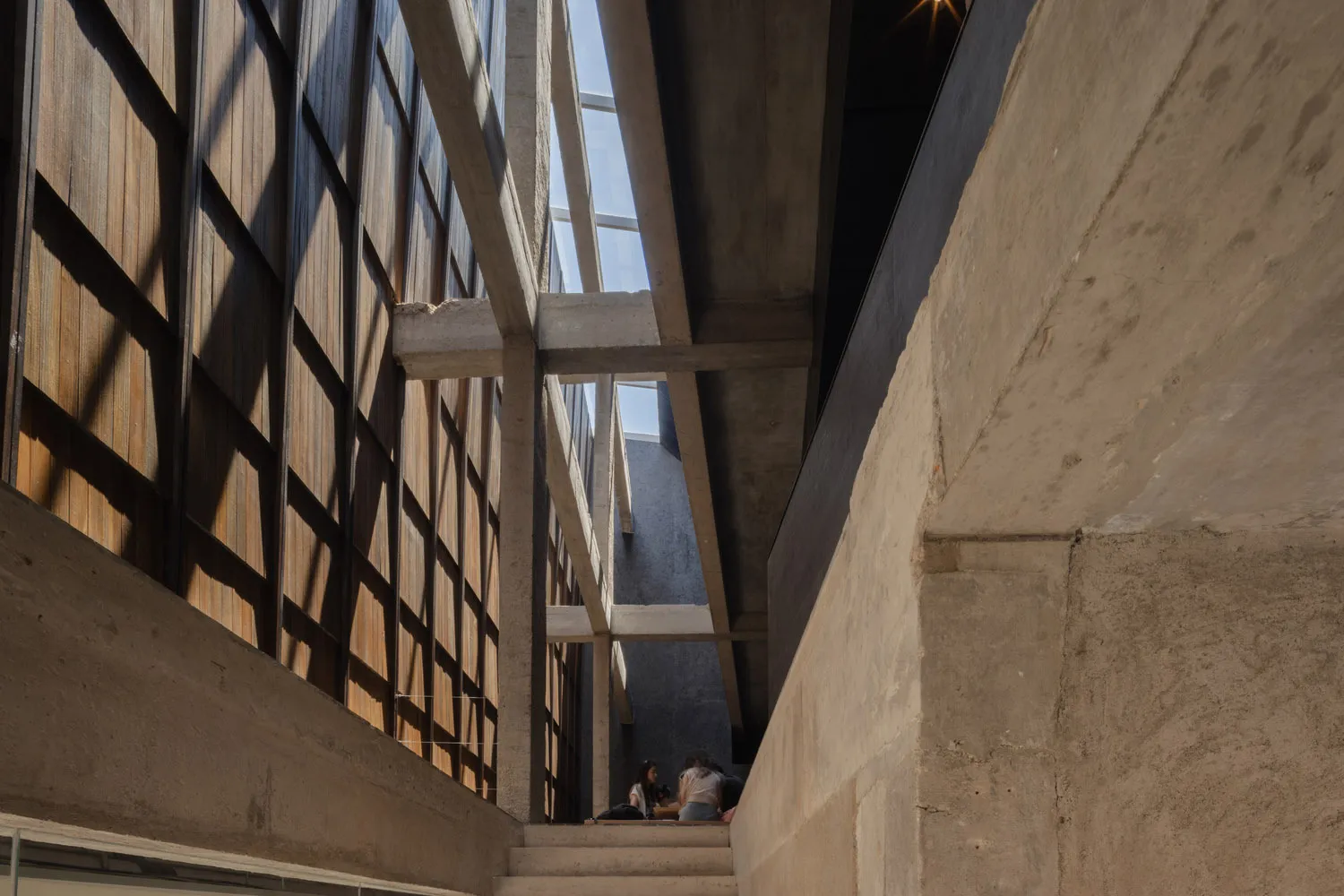 A modern interior with concrete and glass materials