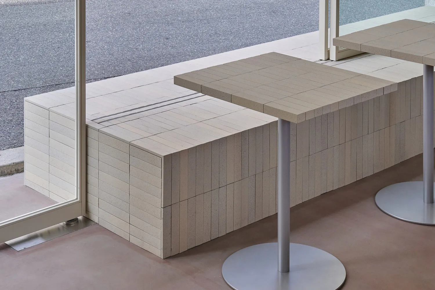 Modern retail storefront featuring a concrete design