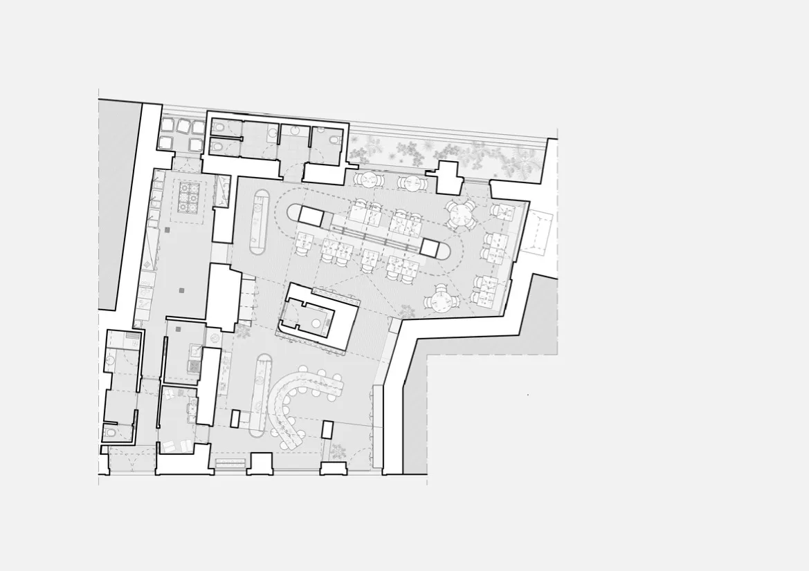 A detailed 2D architectural blueprint of a modern interior space, depicting various functional zones and spatial compositions