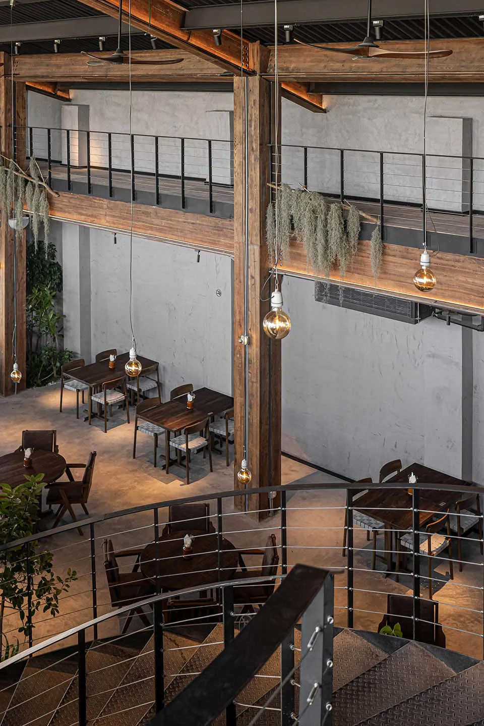 Industrially designed restaurant interior featuring wooden materials