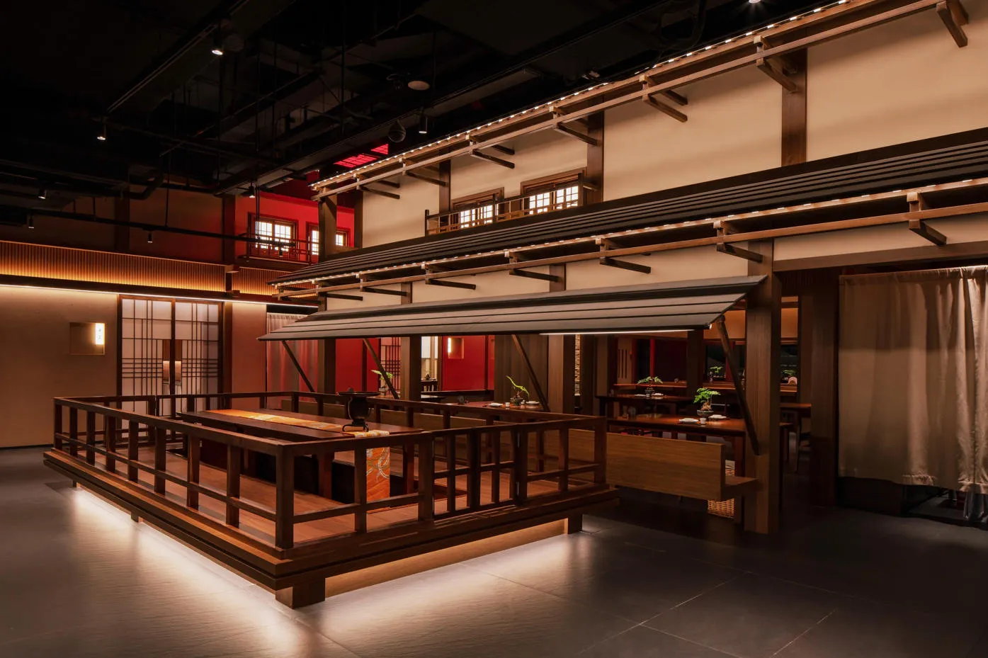 A traditional restaurant interior featuring wooden flooring and seating.