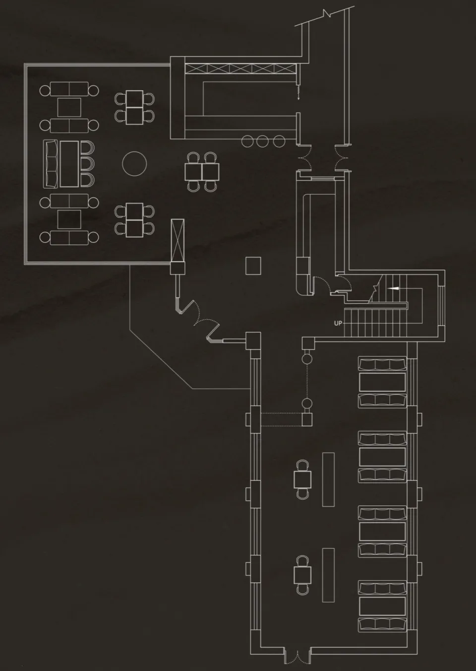 Industrial restaurant design with steel beams and open seating areas.