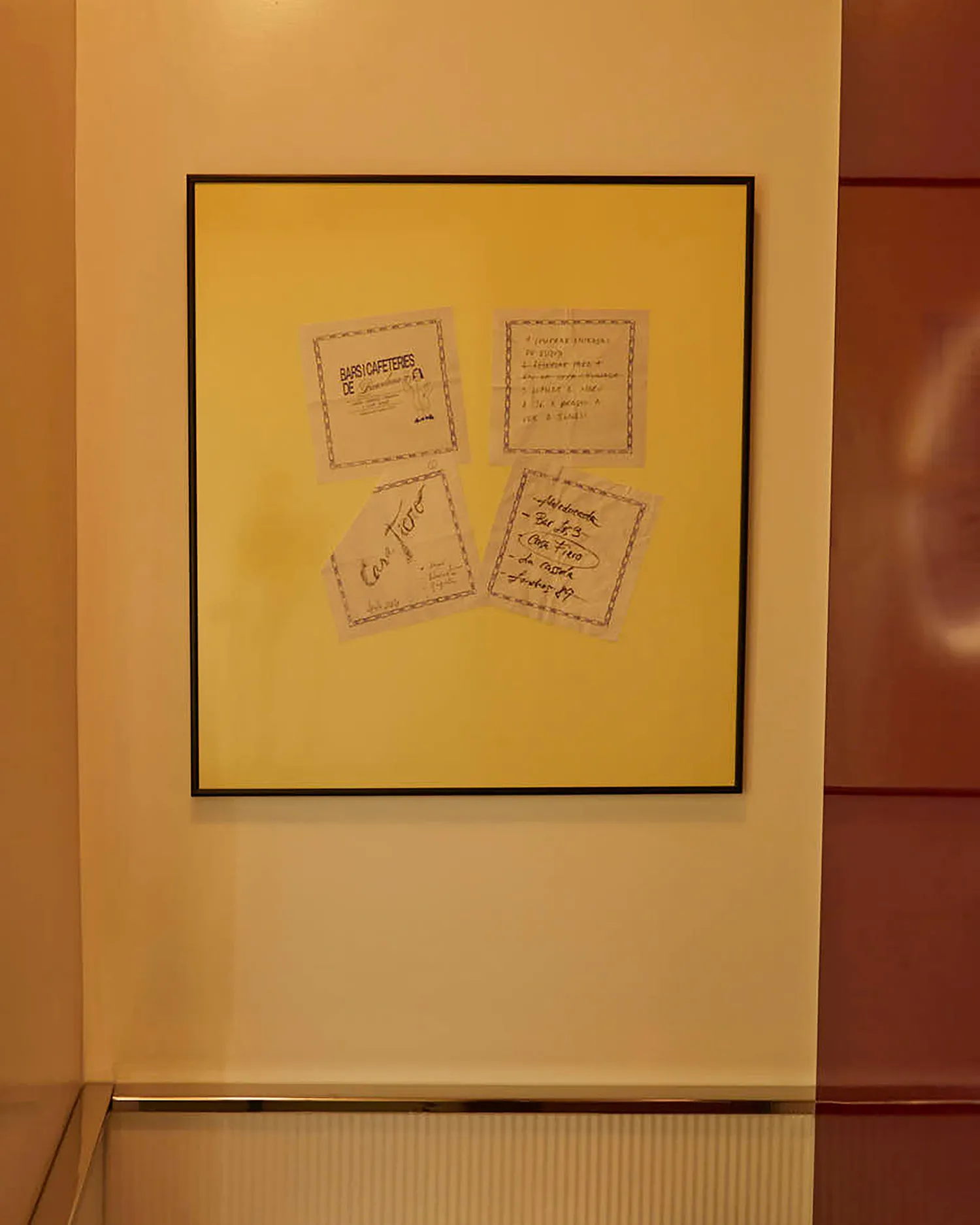 Documents pinned on a yellow background.