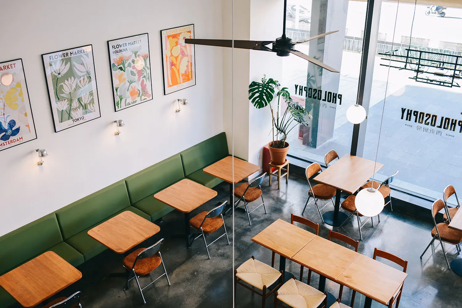 Interior design of a modern restaurant with contemporary seating, tables, and decorative elements.