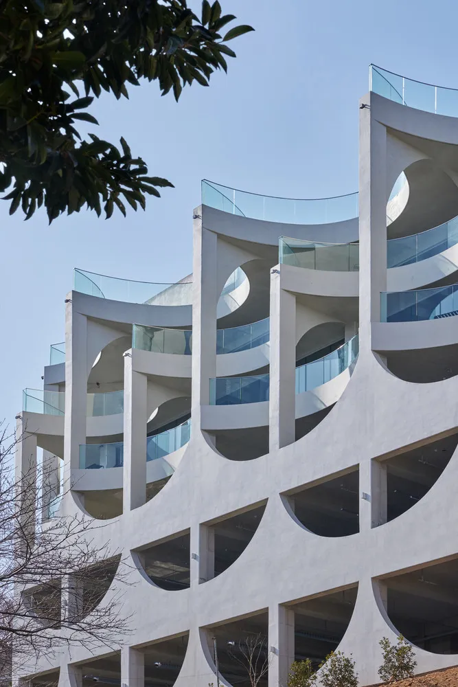 Modern building facade constructed from concrete materials.