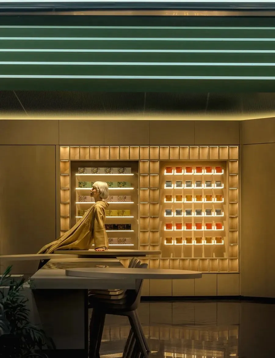 Modern coffee shop with a minimalist interior and wooden display centerpieces showcasing a variety of coffee options.