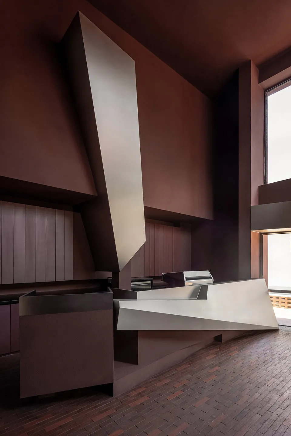 Modern minimalist architecture featuring concrete materials and clean lines.