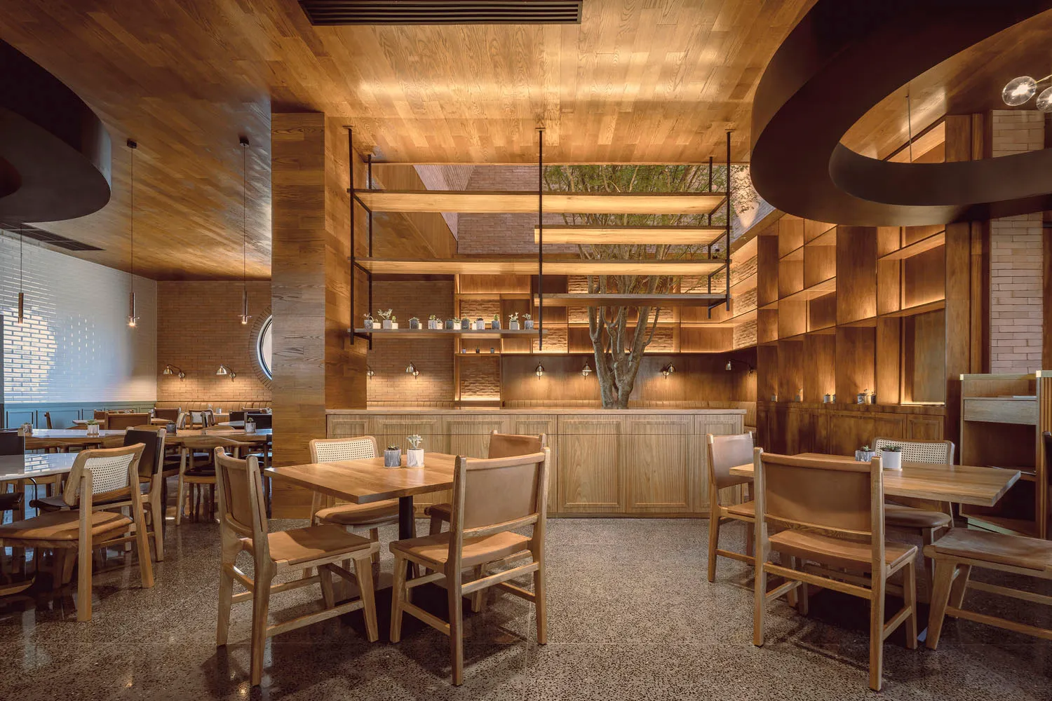 Modern restaurant interior designed with wooden materials and minimalist design