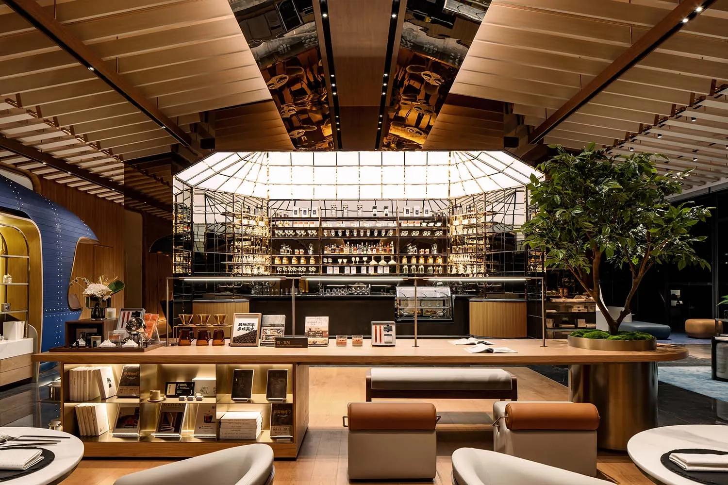 A well-lit, modern coffee shop with wooden accents, showcasing a variety of coffee-related items and a large glass window.