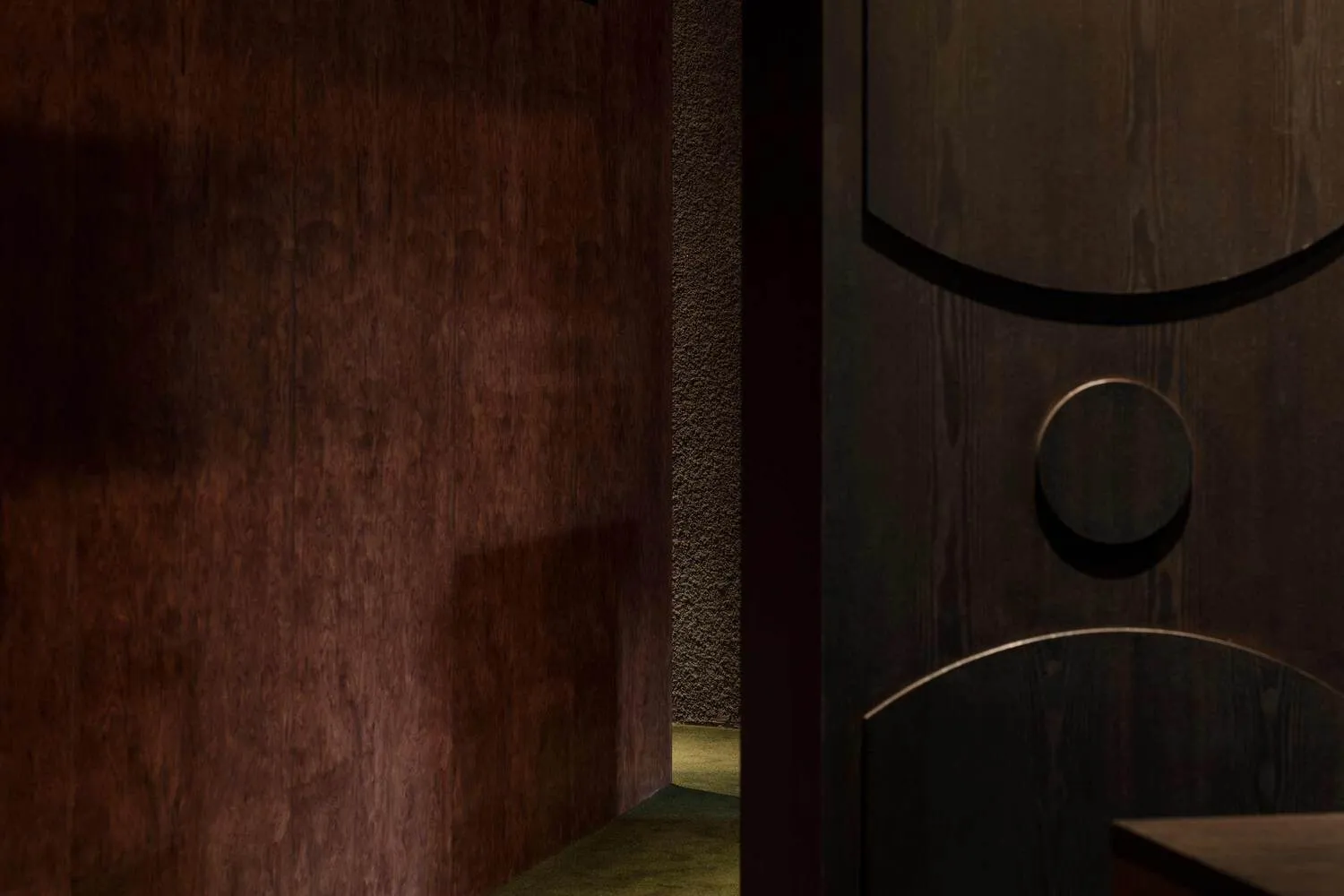Industrial-style interior with metallic finishes and structural elements.
