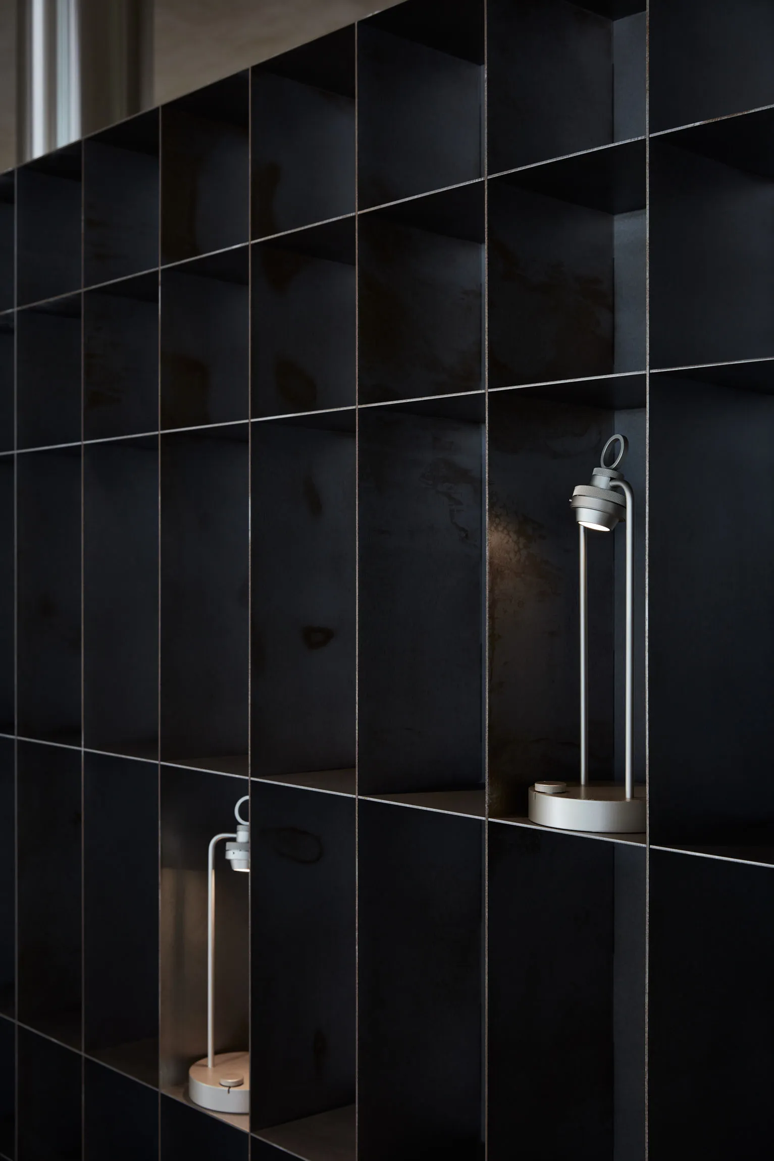 Minimalist interior with metallic shelving system