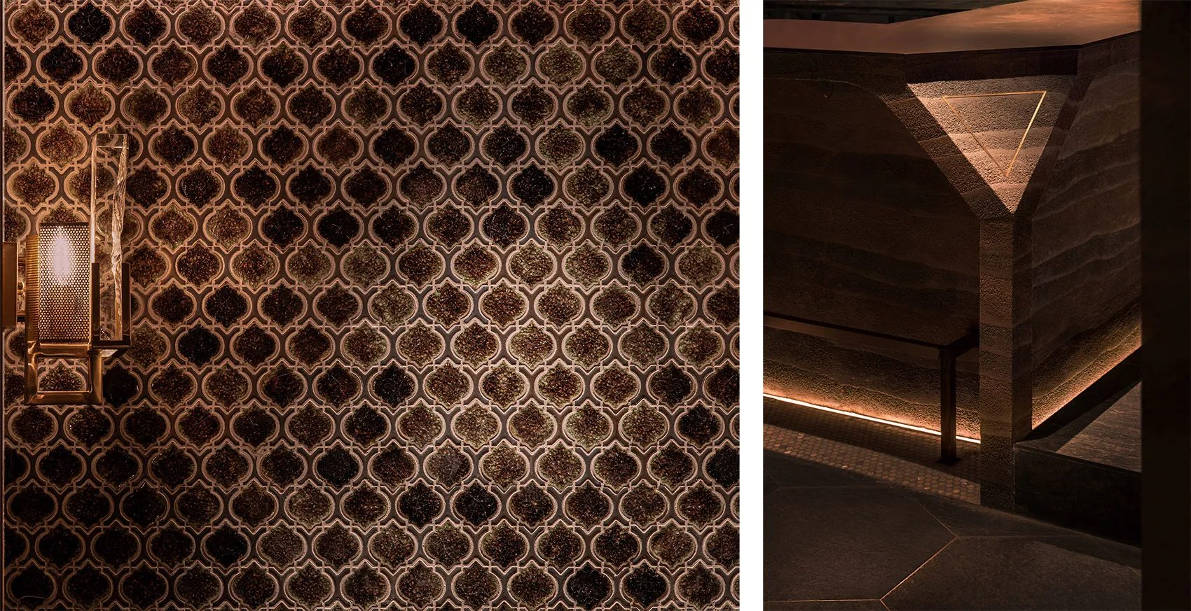 Modern restaurant interior with marble tiles and geometric lighting fixtures.
