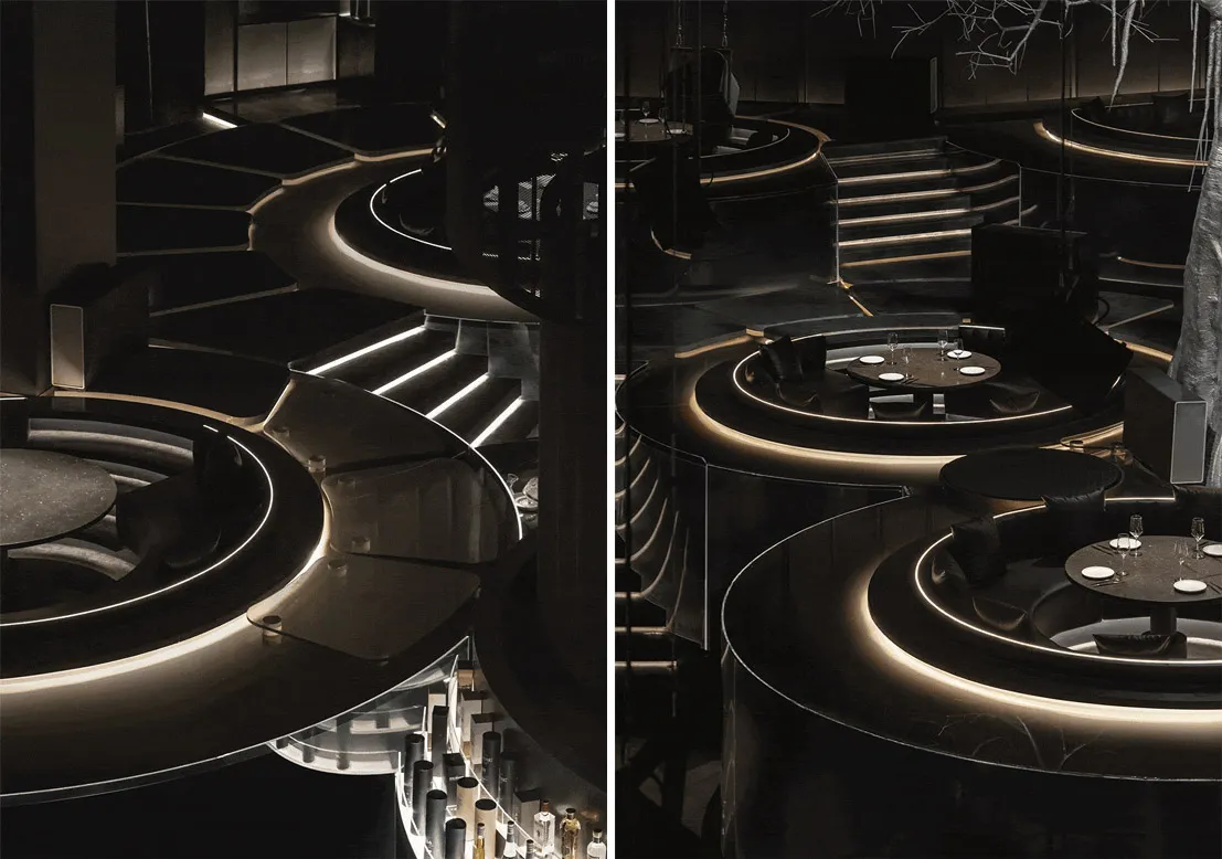 A modern restaurant/bar interior featuring metallic surfaces.